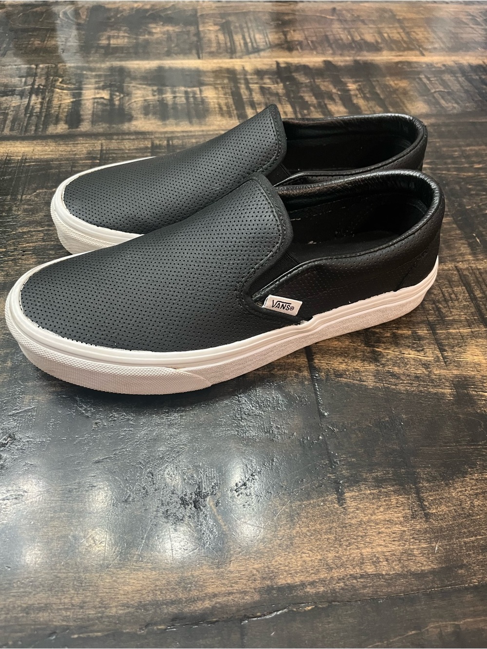 Vans Black Perforated Leather Slip-On Sneakers with White Sole